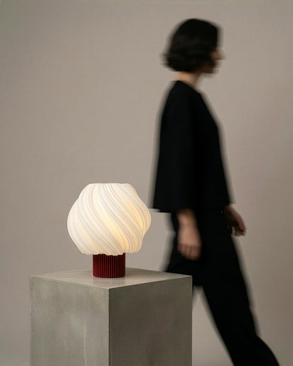 Orea Mini portable 3D printed lamp in a minimalist interior
