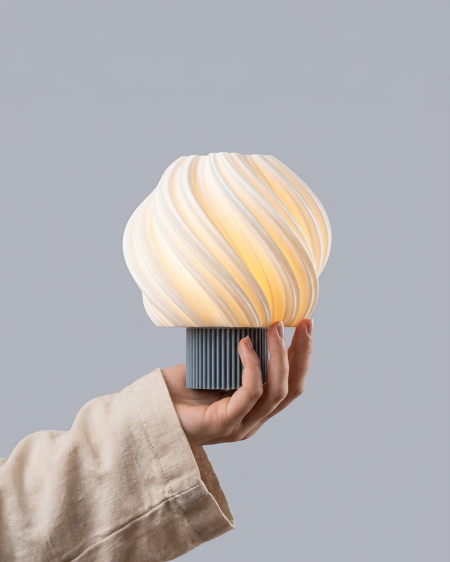 Orea Mini portable 3D printed lamp in a minimalist interior